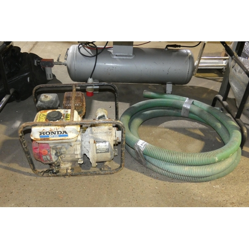 5107 - A Honda water pump (2 inch) powered by a Honda pull start petrol engine supplied with a length of ho... 