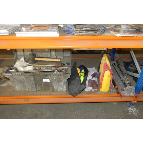 5206 - A quantity of various items including a toolbox with contents, a manual tile cutter, a jump start un... 