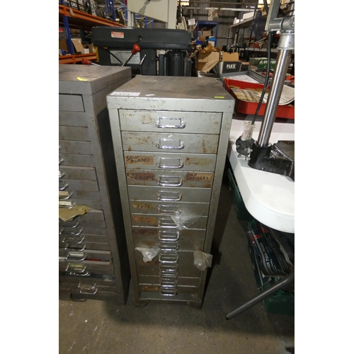 5373 - A 14 drawer index type cabinet containing a large quantity of various taps, dies, die holders, sharp... 