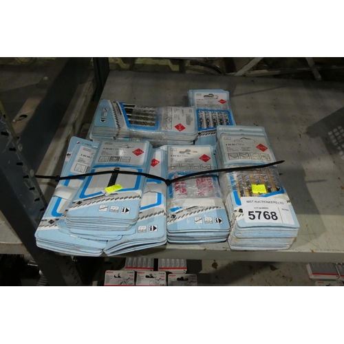 5768 - A quantity of various D + N  jigsaw blades in small retail packs. Contents of stack on left hand sid... 