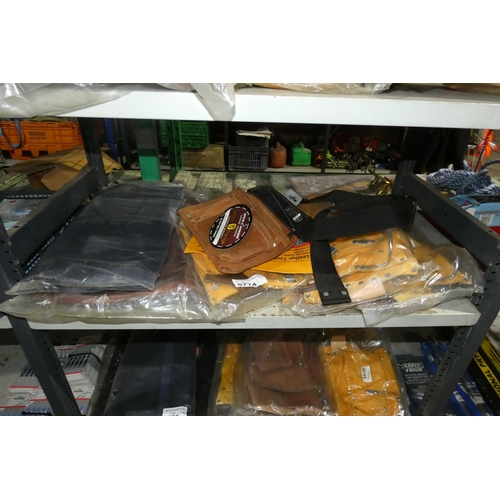 5774 - A quantity of various tool bags, leather tool / nail pouches etc. Contents of 1 shelf