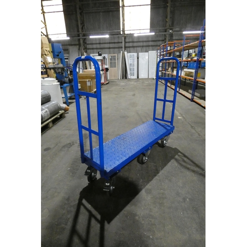 5856 - A blue metal six wheel trolley with handles at both ends, bed size approx 119 x 38cm (ex-manufacturi... 