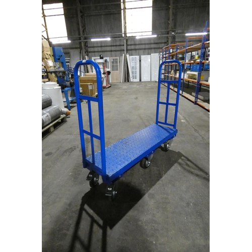 5857 - A blue metal six wheel trolley with handles at both ends, bed size approx 119 x 38cm (ex-manufacturi... 