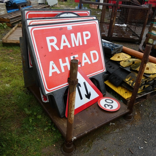 6145 - 1 stillage containing a qty of various road signs.