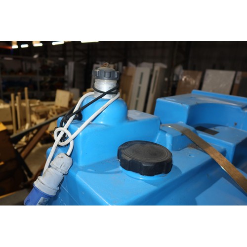 6105 - A blue plastic tow behind water bowser on a braked single axle trailer, capacity approx 2500L, has a... 