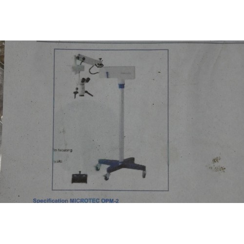 5546 - A Microtec operating microscope with wheeled stand type OPM-2, 220v. This microscope is unused, supp... 