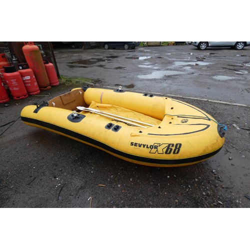 27 - Yellow 9 ft twin skin Inflatable dinghy by Sevylor K68. with oars. 10% BP