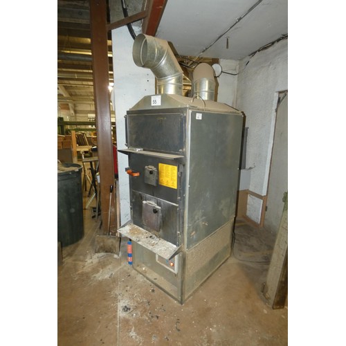 55 - A Fabbri model F55CV blown air workshop waste wood burning stove (55kw) with flue fan, YOM 2011, 240... 