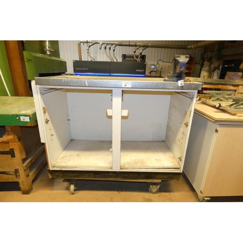 96 - An open front cabinet with stainless steel top and a Record vice fitted approx 121 x 60cm x 91cm hig... 