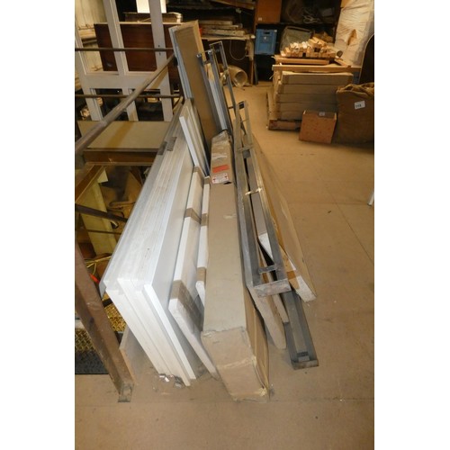 124 - A quantity of various items including wardrobe doors / internal components, 3 x metal support frames... 