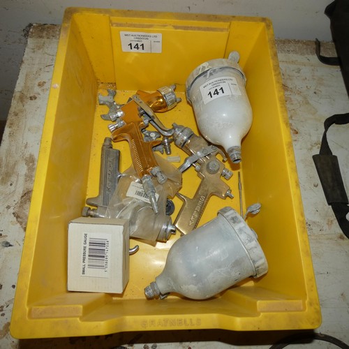 141 - A yellow plastic box containing several paint / stain spraying guns