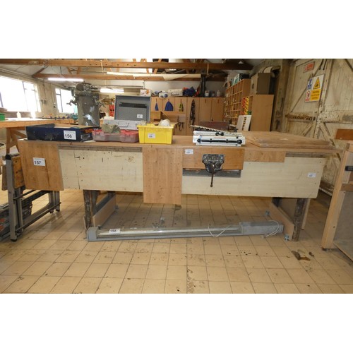 157 - A work bench with a Woden wood working vice fitted approx 275 x 90cm