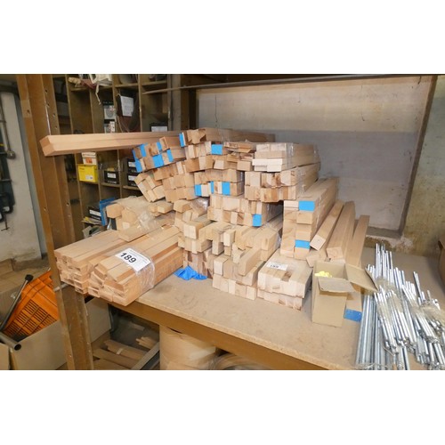 189 - A quantity of various pre-cut lengths of wood and threaded metal bar. Contents of 1 shelf