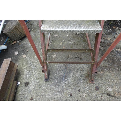 201 - A set of metal warehouse steps. Please note bottom step is missing and one wheel requires attention