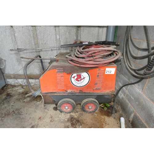 212 - A Demon steam cleaner with lance and hose. Please note this steam cleaner appears not to have been u... 