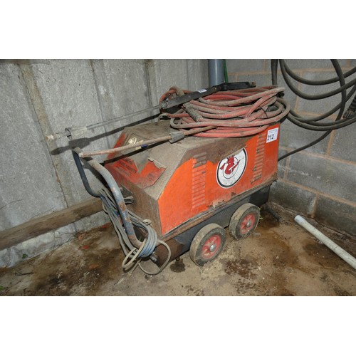 212 - A Demon steam cleaner with lance and hose. Please note this steam cleaner appears not to have been u... 