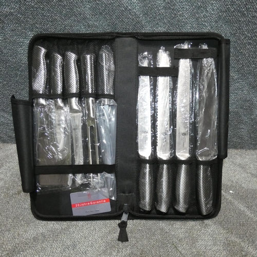 1023 - A 9 piece knife set by Samurai in a soft carry case