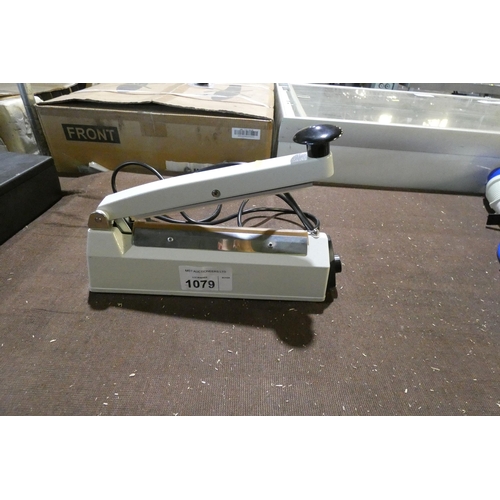1079 - A small electric heat sealer by Kite Rackaging - trade