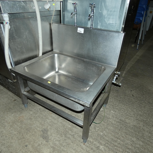 1114 - A low commercial stainless steel sink with splash back panel, approx 76x62x100cm inc taps, sink is 4... 