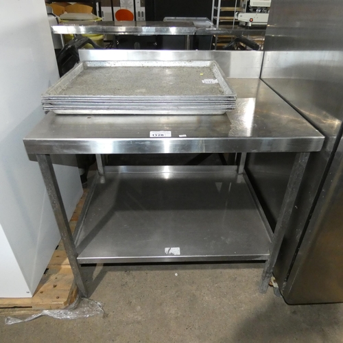 1128 - A commercial stainless steel catering type table by Moffat with shelf beneath approx 58x70cm