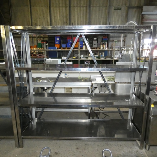 1138 - A commercial stainless steel catering type rack with 4 shelves approx 192x58x181