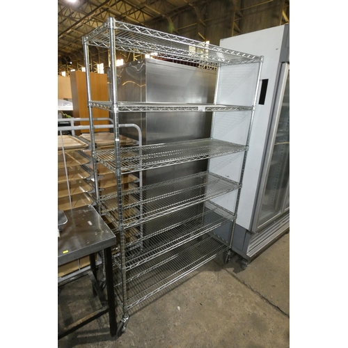 1156 - A mobile catering type rack with 6 shelves approx 121x46x194cm