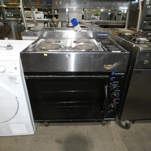 1172 - A commercial stainless steel 4 ring hob and turbo fan oven beneath by Blueseal, fitted with an indus... 