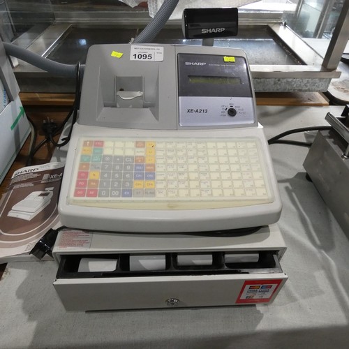 1095 - A cash register by Sharp type XE-A213 with instructions and till rolls - trade 
 Tested Working