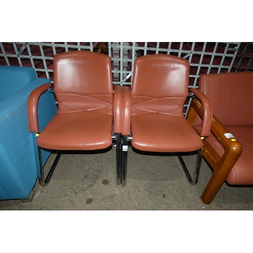 1210 - 2 x terracotta upholstered cantilever office chairs by Girsberger