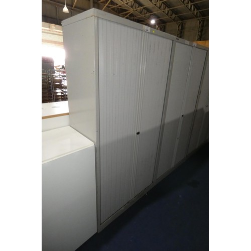 1246 - A tall metal 2 door tambour cabinet by Bisley approx 100x47x197cm