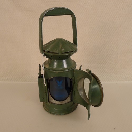 A WW2 green painted British Army issue railway lamp by C Eastgate