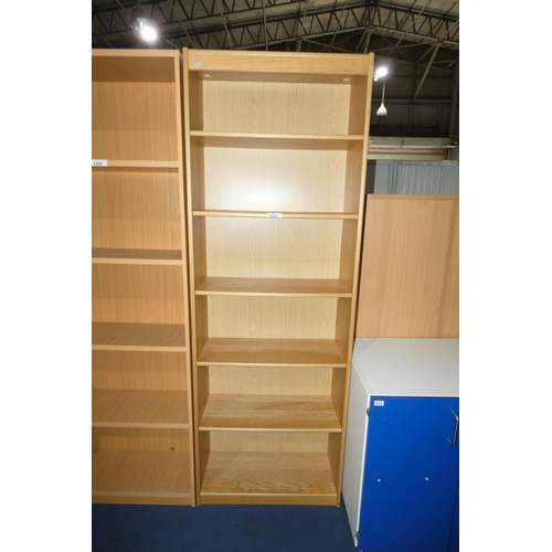 1295 - A tall wood effect office book case approx 75x30x214cm