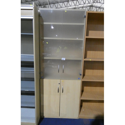 1297 - A tall wood effect office cabinet with a 2 glass door cupboard above and 2 door cupboard beneath, ap... 