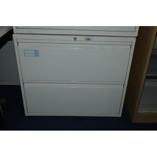 1300 - A white metal 2 drawer lateral cabinet approx 80x48x69cm