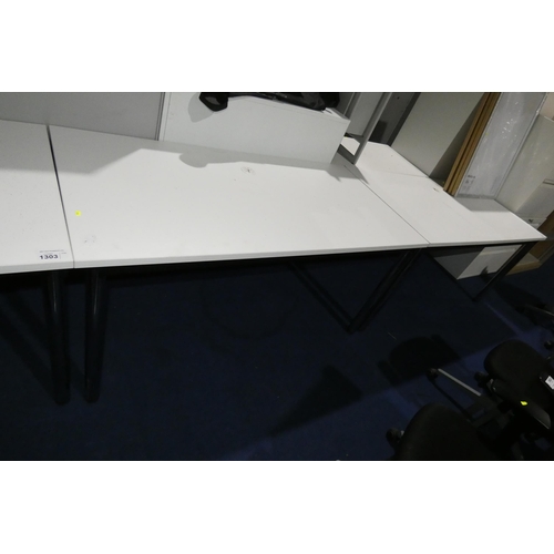 1302 - 2 x rectangular white tables/desks approx 150x75cm. Please note that the tops will lift off and the ... 