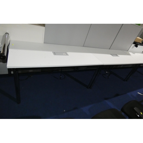 1303 - 2 x rectangular white tables/desks approx 150x75cm. Please note that the tops will lift off and the ... 