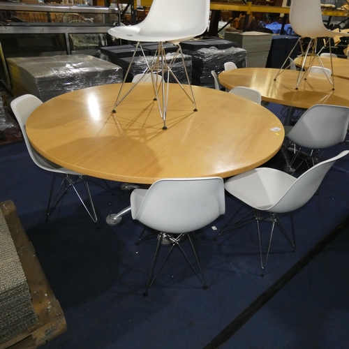 1329 - A large round wood effect table with decorative aluminium metal base approx 150cm