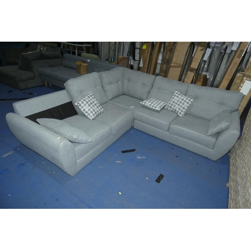 619 - A light grey upholstered two part corner sofa approx 230cm x 230cm. Please note that this corner sof... 