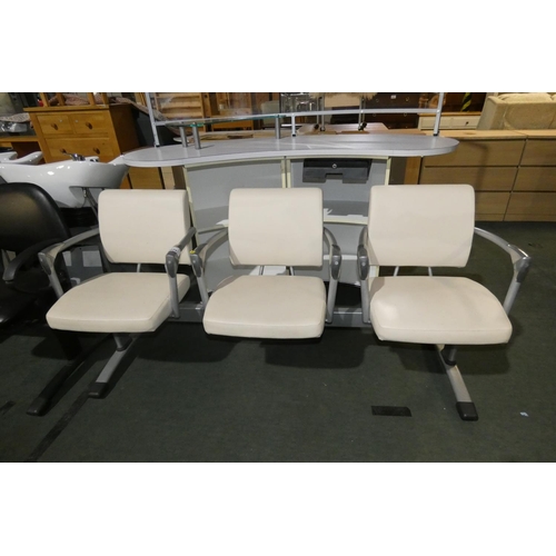 2226 - A cream upholstered 3 seater salon bench