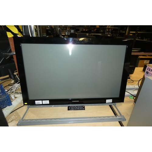 2400 - A Samsung plasma display type PS42a457p1d no stand but has a remote, comes with wall bracket - trade