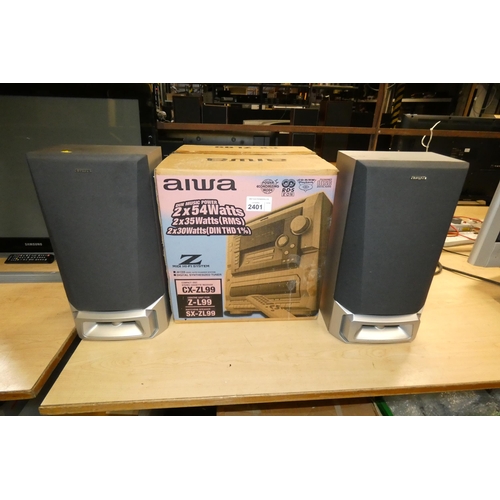 2401 - A stereo system by Aiwa type CX-ZL99 unit is boxed and includes speakers, remote control, instructio... 