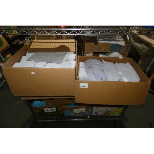 2596 - A quantity of various paper gift bags and plastic bags, contents of 1 shelf