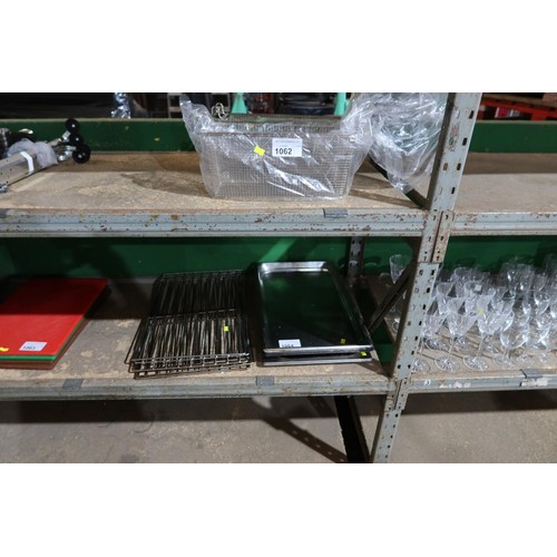 1064 - A quantity of various stainless steel gasteronorms and wire racks