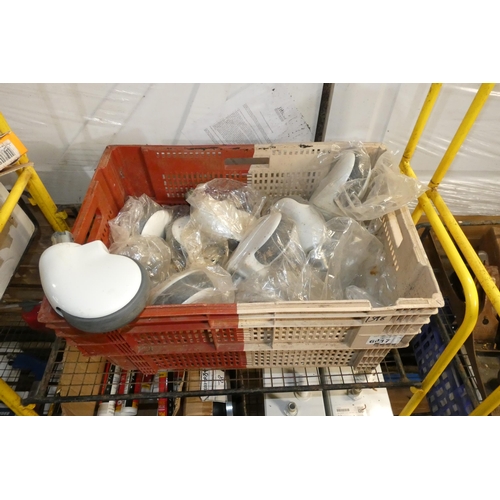 6017 - 1 plastic crate containing a quantity of white caster type wheels. Plastic crate is included.