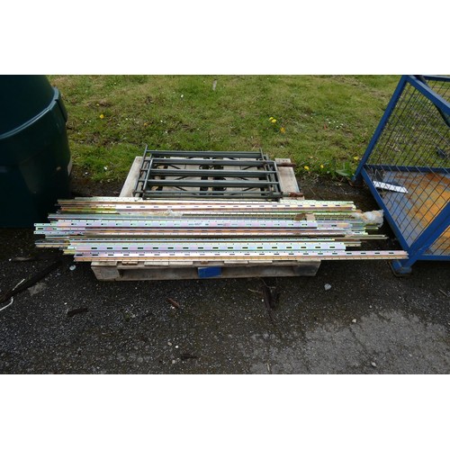 6827 - 1 pallet containing a quantity of metal rails measuring up to approx 180cm and a small quantity of m... 