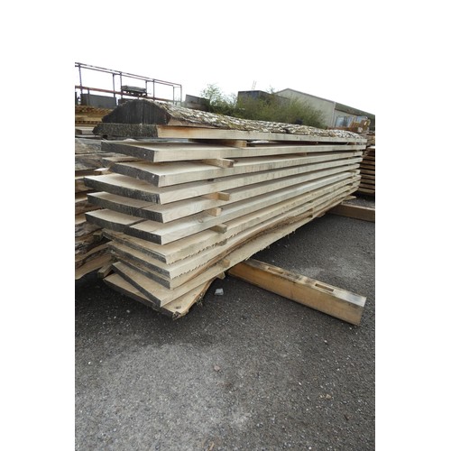 6873 - A quantity of Ash waney edge boards measuring up to approx 32cm x 3cm x 245cm