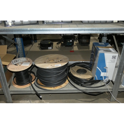 6603 - A quantity of various cable including a part used 100m drum of 2.5mm 3 core armoured cable. Contents... 