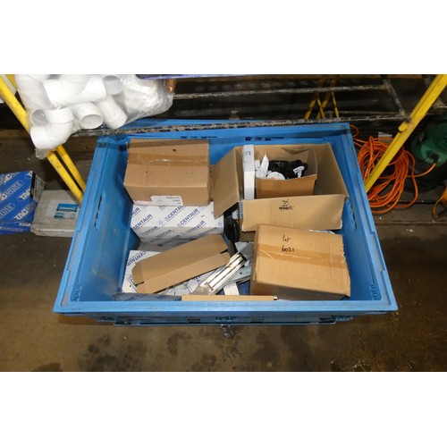 6021 - A quantity of various items including white plastic pipe fittings, brackets etc. Contents of 2 shelv... 