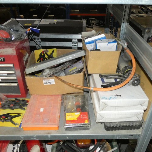 6689 - A quantity of various items including a Sealey red metal workshop tool box, mortar guns etc. Content... 