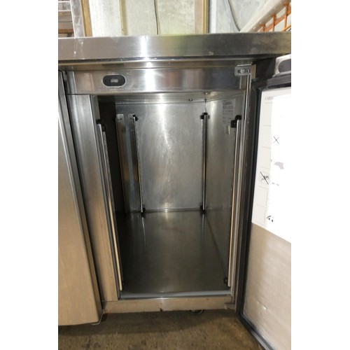 1141 - A large commercial stainless steel 4 door bench fridge by Foster type Supra approx 233x77cm - trade